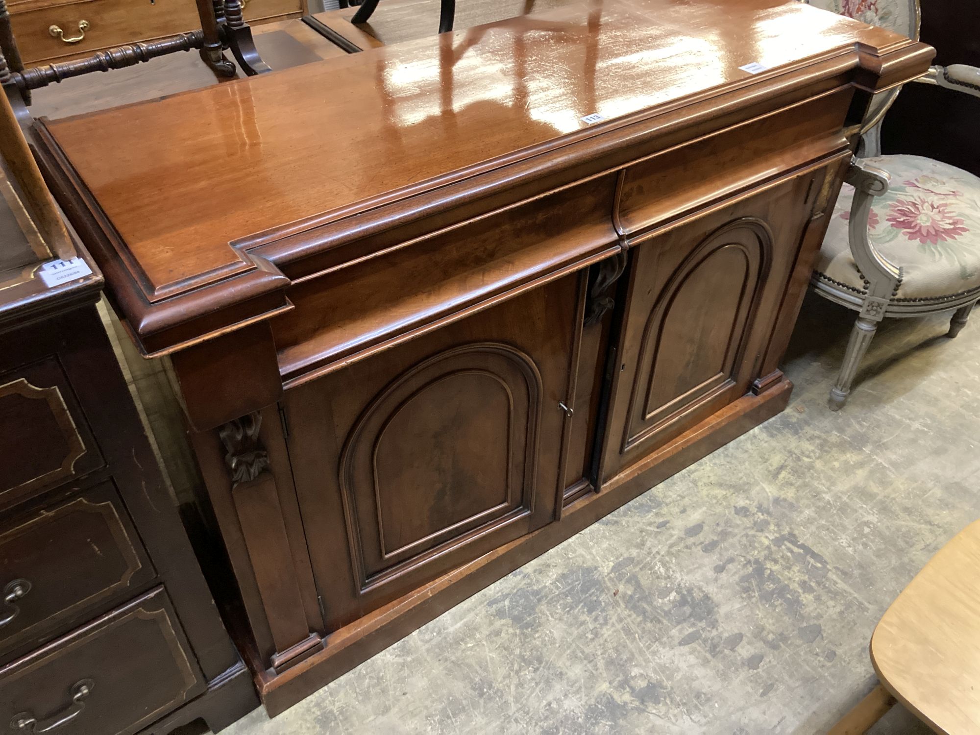 A Victorian mahogany chiffonier, length 136cm, depth 52cm, height 90cm